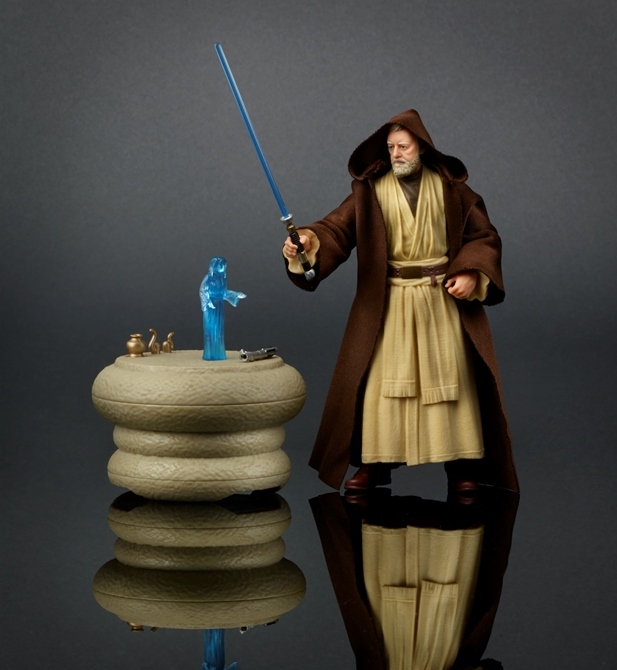 Recreate the noble journey of the great Jedi Master with the highly collectible Obi-Wan Kenobi Pack. Featuring authentic, movie-accurate detail, this elite 6-inch scale Obi-Wan Kenobi figure comes equipped with Jedi robe, 2 lightsabers, an electronic light-up table, and Princess Leia hologram delivering a vital message. 